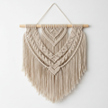 Handcrafted boho macrame wall hanging in neutral beige cotton rope